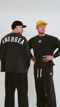 Energea Fit Wear Coal Joggers - premium men's black joggers worn by two men, Israeli activewear brand